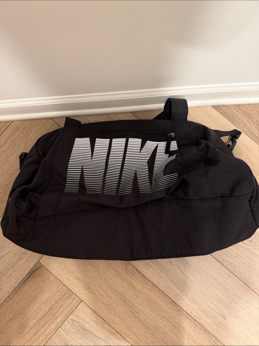 Nike Black small Gym Duffel with White Striped Logo